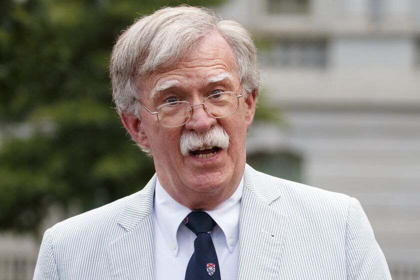 FILE - In this July 31, 2019 file photo, then National security adviser John Bolton speaks to media at the White House in Washington. Bolton says he's 'prepared to testify' in Senate impeachment trial if subpoenaed (AP Photo/Carolyn Kaster)