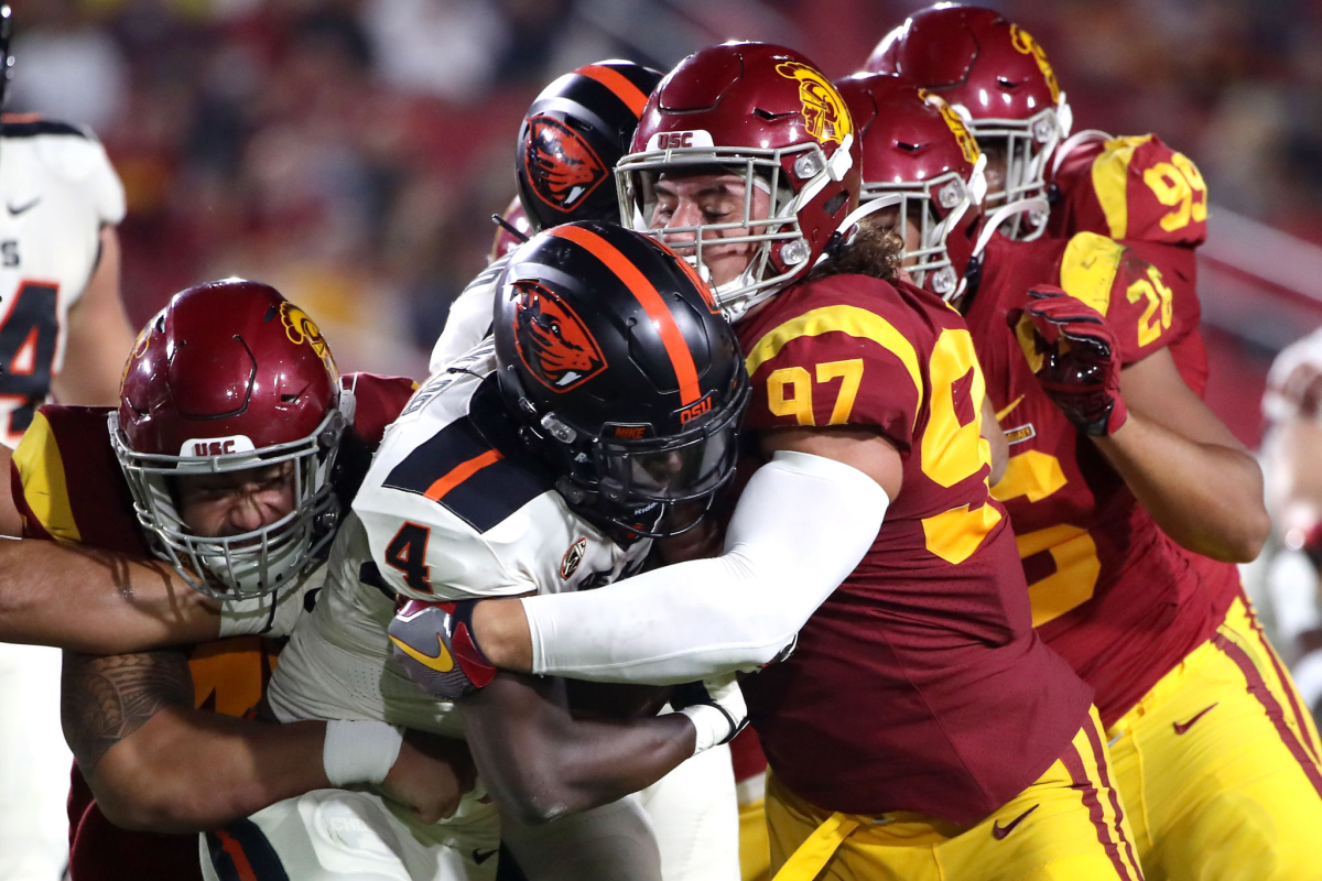 USC's Jacob Lichtenstein tackles Oregon State's B.J. Baylor