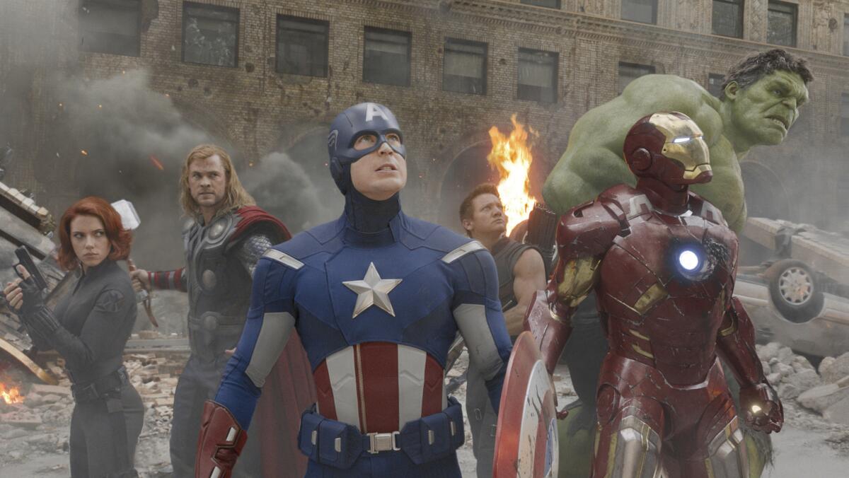 Scarlett Johansson, Chris Hemsworth, Chris Evans, Jeremy Renner, Robert Downey Jr. and Mark Ruffalo in the movie "The Avengers."