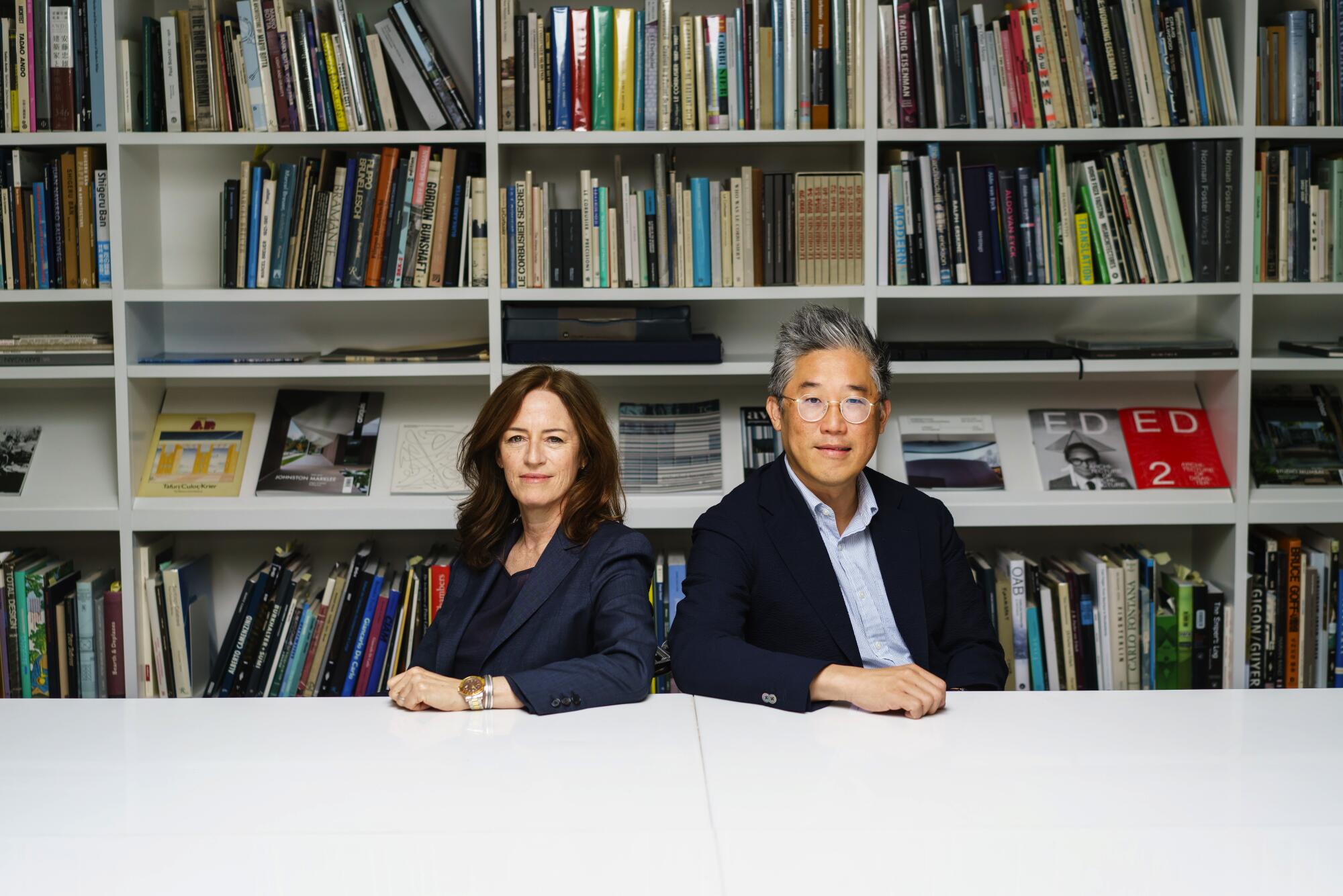 Sharon Johnston and Mark Lee in their studio's library in 2019.