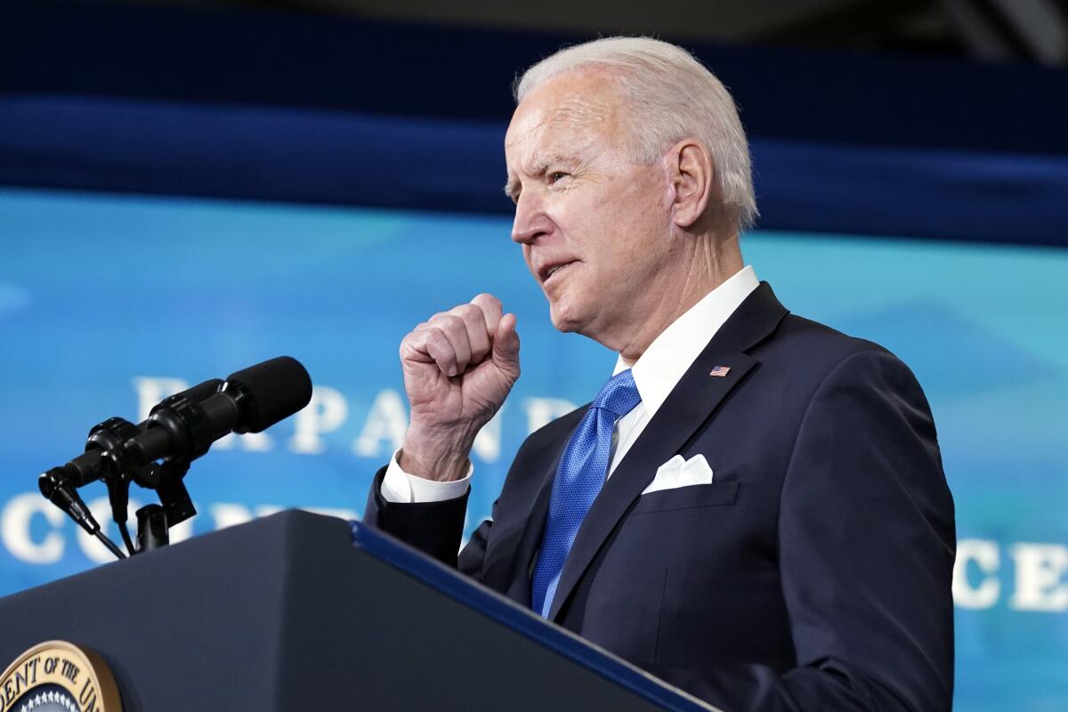 President Joe Biden, accompanied by Johnson and Johnson Chairman and CEO Alex Gorsky, and Merck Chairman and CEO Kenneth Frazier, speaks at an event in the South Court Auditorium in the Eisenhower Executive Office Building on the White House Campus, Tuesday, March 10, 2021, in Washington. (AP Photo/Andrew Harnik)