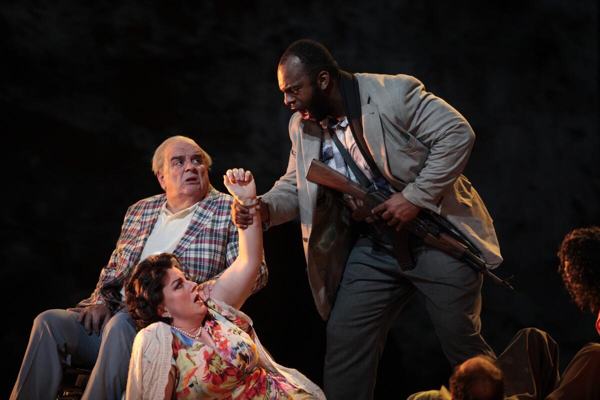 Rambo, performed by Ryan Speedo Green, is one of the Palestinian hostage takers in "The Death of Klinghoffer." Leon Klinghoffer is performed by Alan Opie, left in wheelchair, and his wife Marilyn Klinghoffer is performed by Michaela Martens (left on ground).