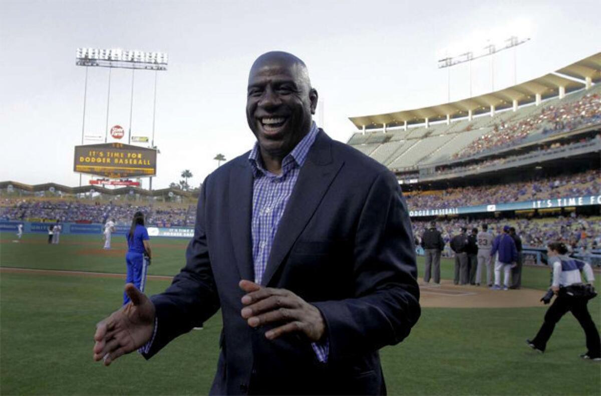Magic Johnson took questions from players during his first visit with the Dodgers this spring.