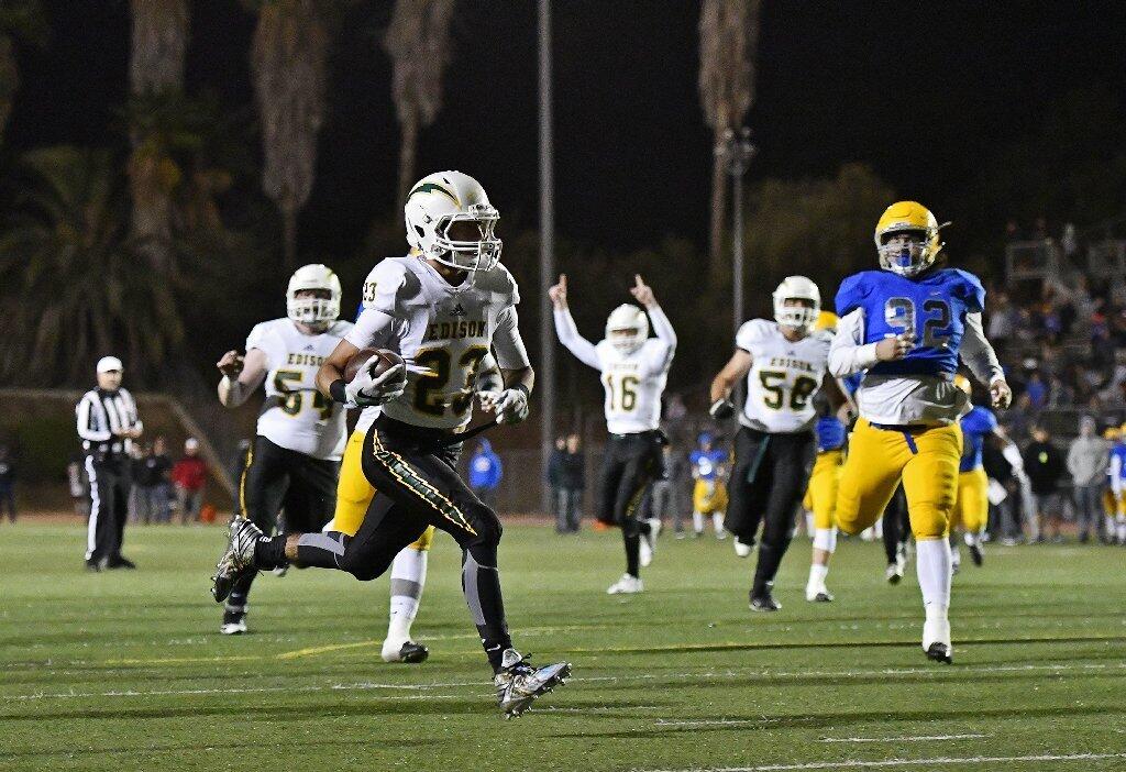 Edison's EJ Ginnis goes in for a touchdown on a run in the second half during the CIF Southern Section Division 3 championship game against La Mirada on Friday.