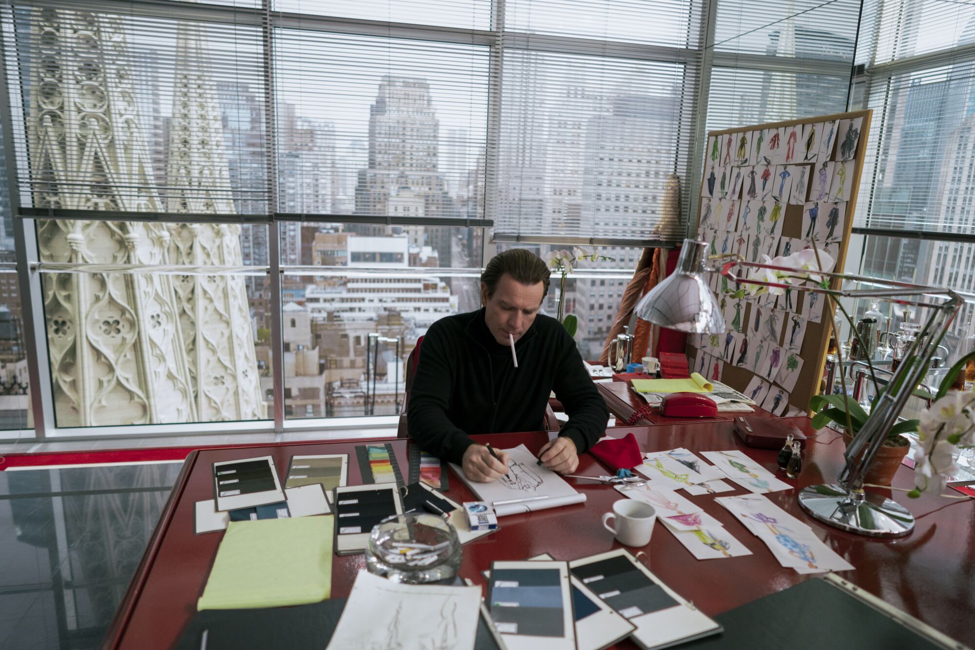Ewan McGregor portrays  fashion designer Halston at work in his high-rise office in New York
