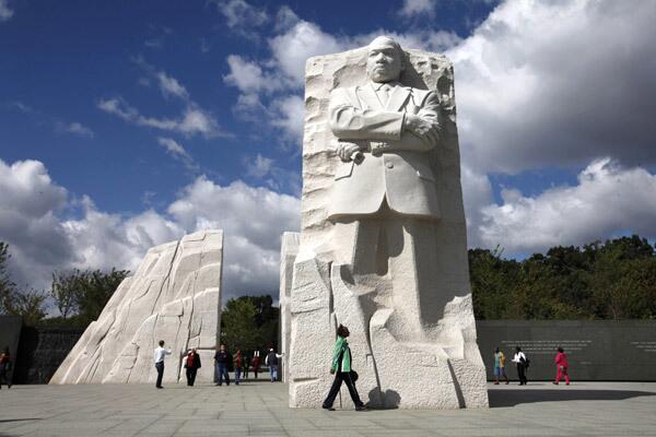 A visitor walks through the Martin Luther King Jr. Memorial in Washington. The memorial opened in 2011, southeast of the Lincoln Memorial where King delivered his famous "I Have a Dream" speech.