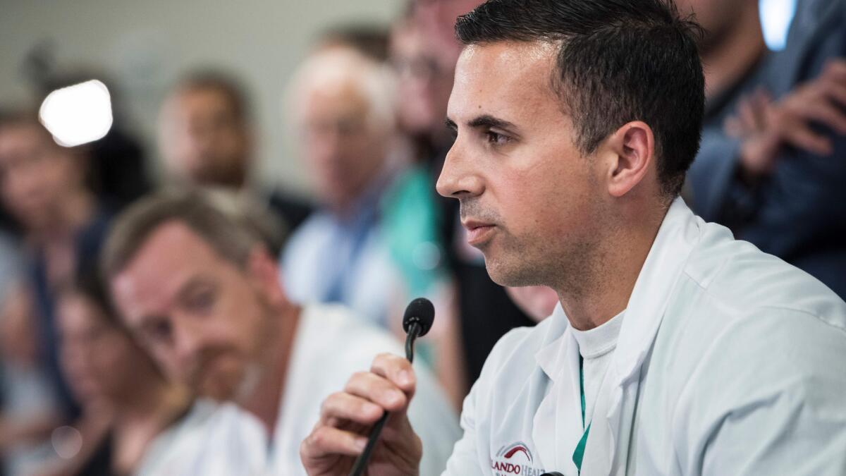 Dr. Joseph Ibrahim speaks during a news conference with Orlando health trauma staff and Angel Colon, a survivor of the Pulse nightclub mass shooting, at the Orlando Regional Medical Center on June 14, 2016.