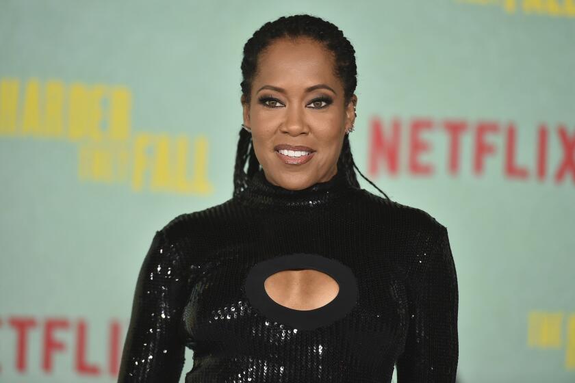 FILE - Regina King arrives at a special screening of "The Harder They Fall" on Wednesday, Oct. 13, 2021, at the Shrine in Los Angeles. Ian Alexander Jr., the only child of award-winning actor and director Regina King, has died. The death was confirmed Saturday, Jan. 22,2022 in a family statement. (Photo by Richard Shotwell/Invision/AP, File)