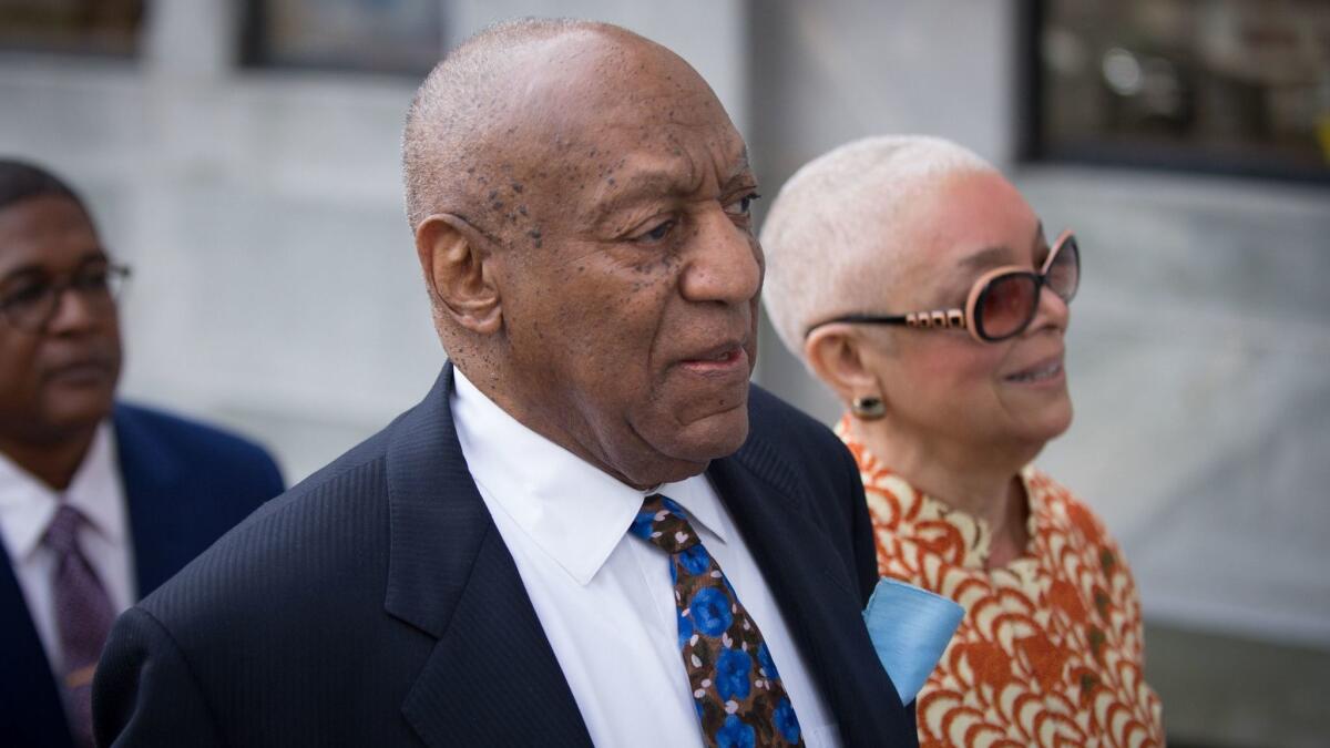 Bill Cosby and his wife, Camille, arrive at the Montgomery County Courthouse in Norristown, Pa.