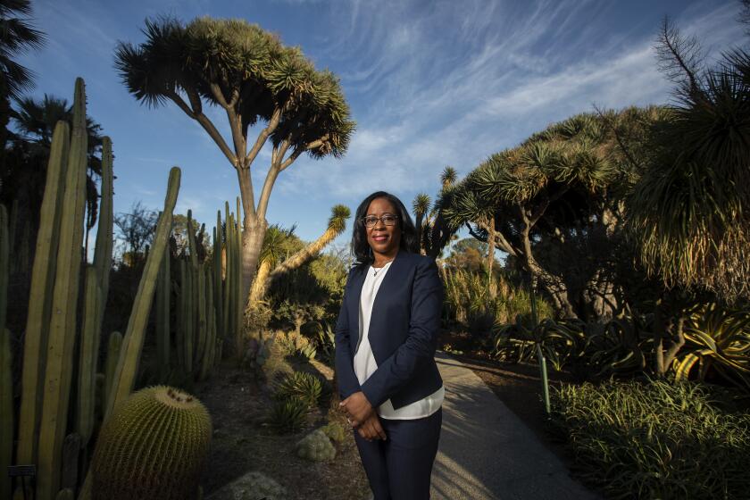 SAN MARINO, CA - MARCH 19, 2021: Misty Bennett, the new chief Human Resources officer at the Huntington Library in San Marino, is photographed inside the desert garden on the library grounds. Bennett is rethinking how the Huntington recruits and retains staff, etc. Henry Huntington was a union buster who exploited Mexican labor. In the age of social and racial equality, the institution that bears his name is now reckoning with its history. Progress has been slow but the gears are beginning to shift at one of L.A.'s oldest institutions. (Mel Melcon / Los Angeles Times)