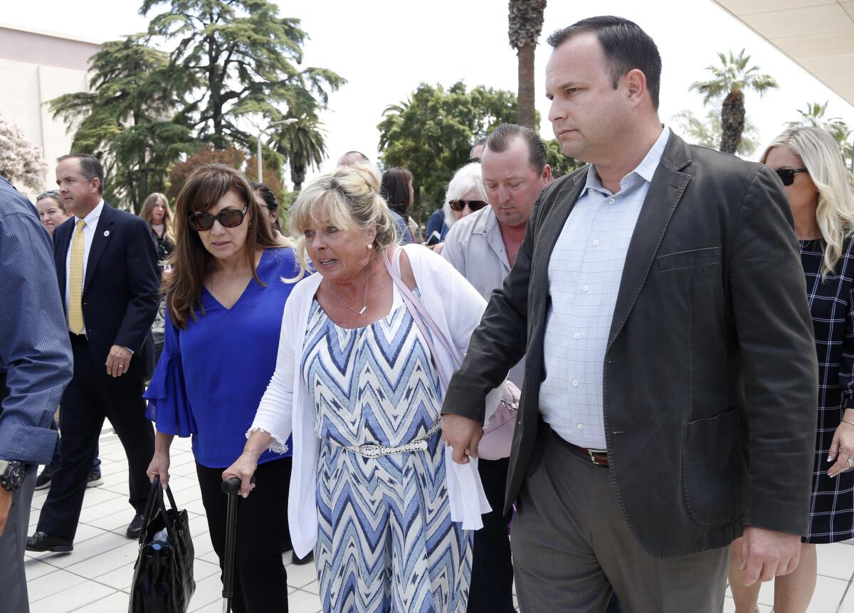 Susan Blake, center, the mother of Joseph McStay, leaves the San Bernardino Superior Court after the guilty verdicts in San Bernardino.