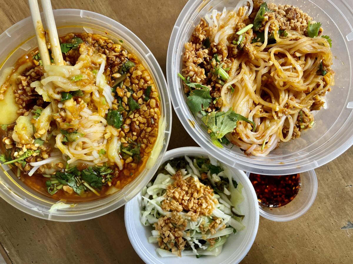 Shan tofu noodles, 'sour cabbage salad,' noodles with no tofu, and chile oil from Asia Supermarket