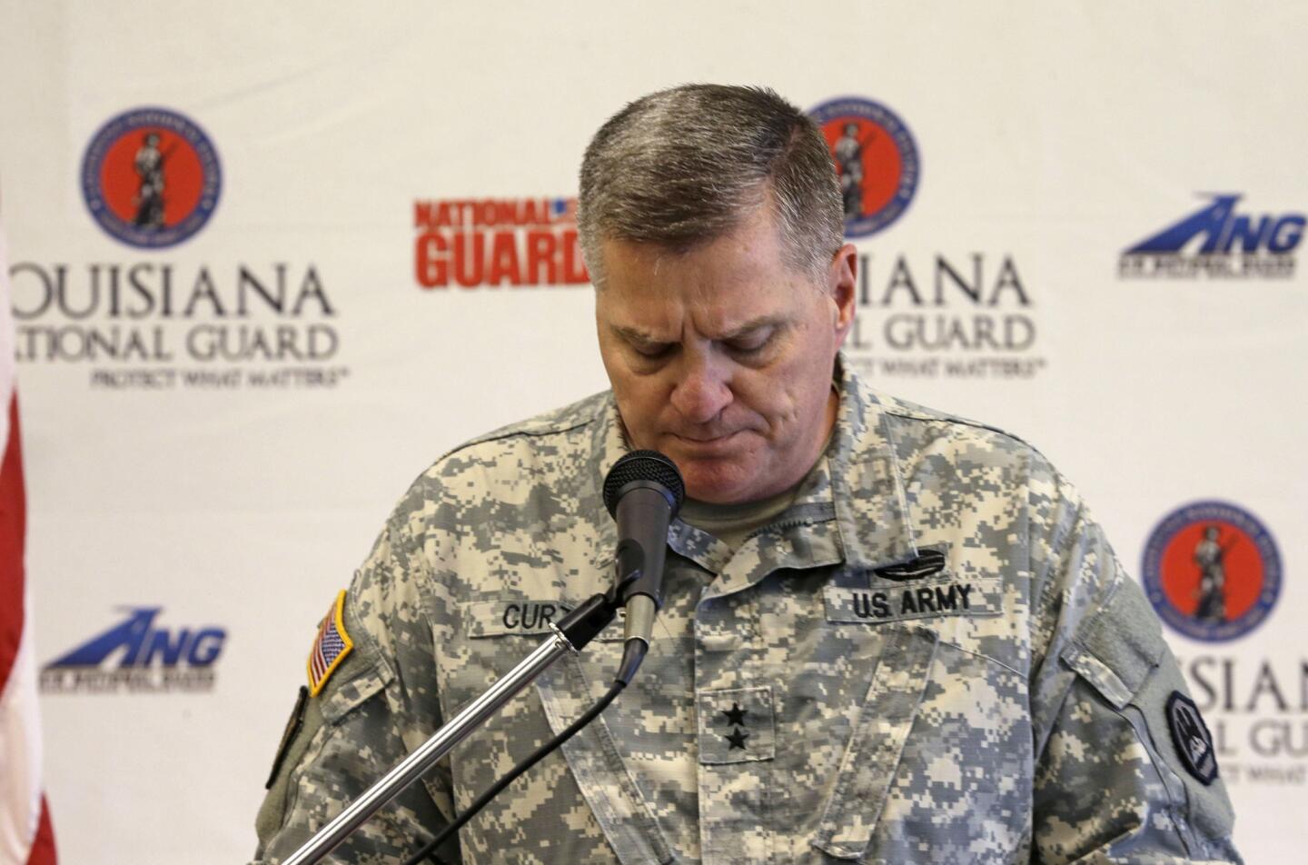 Louisiana National Guard Major General Glenn Curtis speaks at a news conference regarding the crash of a military helicopter, in Hammond, La., Wednesday, March 11, 2015. Two helicopters flew in the nighttime training mission that cost the lives of seven Marines and four soldiers, but one turned back in the dense fog, military officials said.