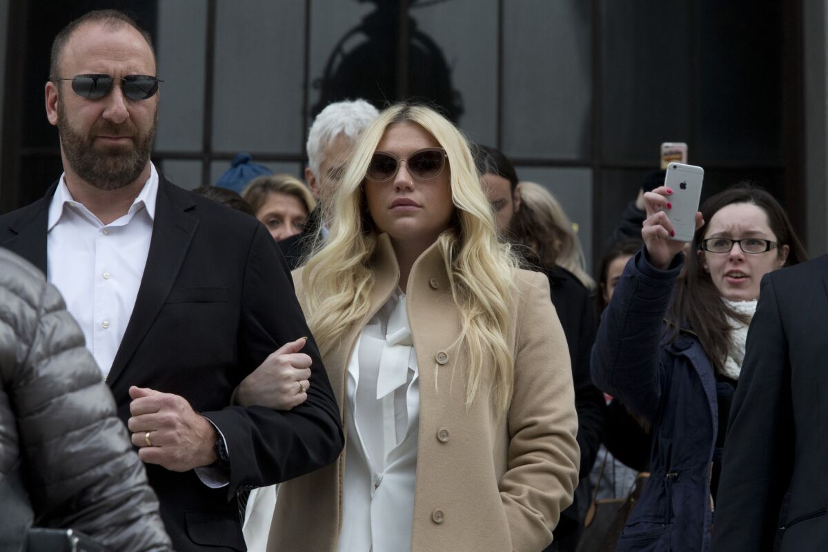 Pop star Kesha leaves a New York courthouse on Feb. 19.