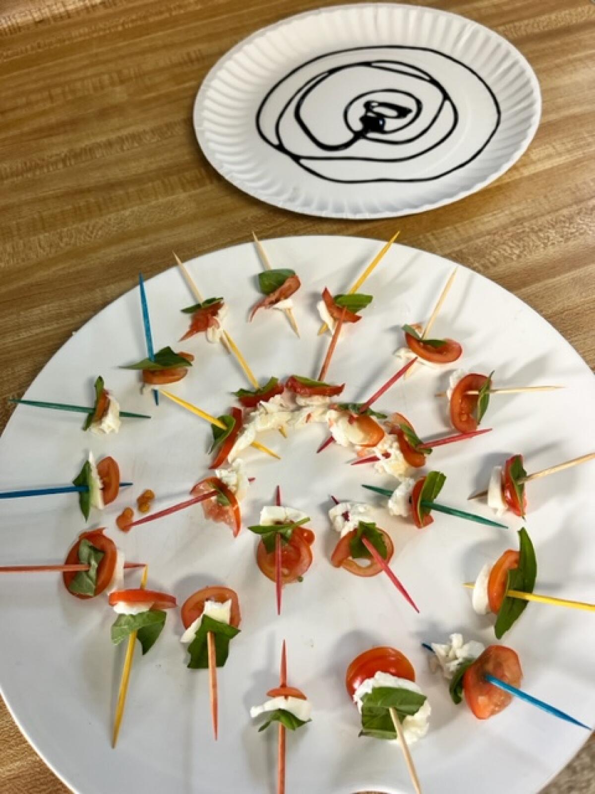 Students at Kinetic Academy enjoyed caprese salad bites over the summer, made with vegetables from gardens on campus.