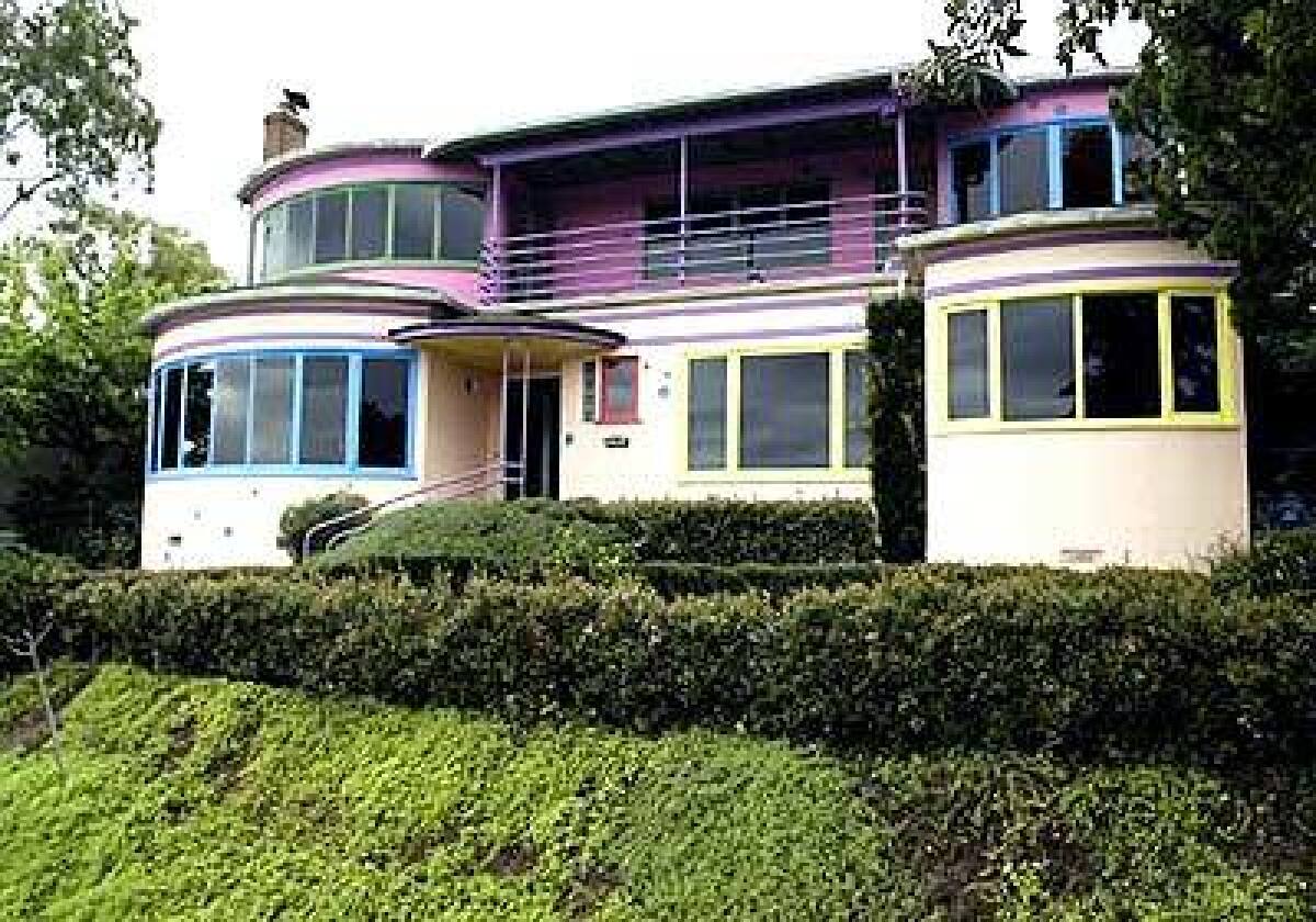 Homeowner Dave Vendig pegged the houses color scheme to a bottle of Pepto-Bismol.