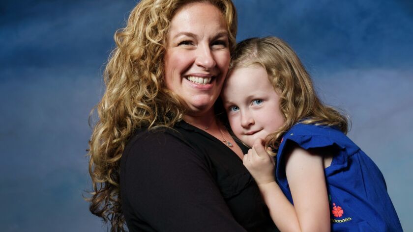 Playwright Molly Smith Metzler with 5-year-old daughter Cora.