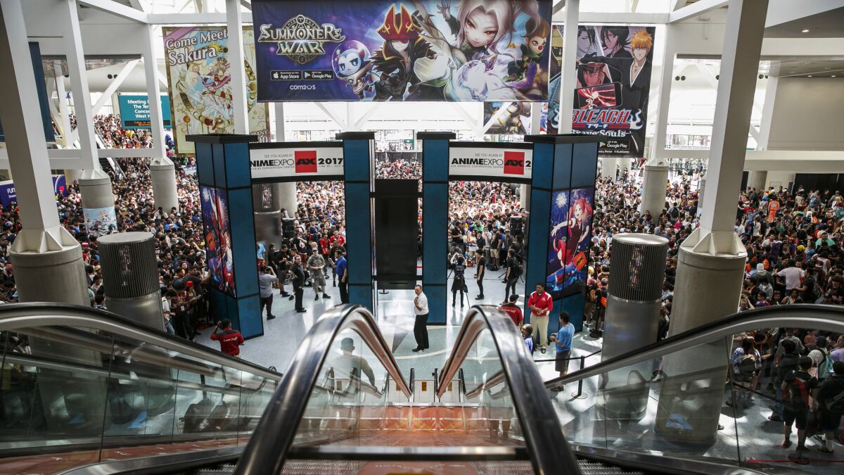 A huge crowd awaits the opening of the Anime Expo 2016, in Los Angeles on July 1.