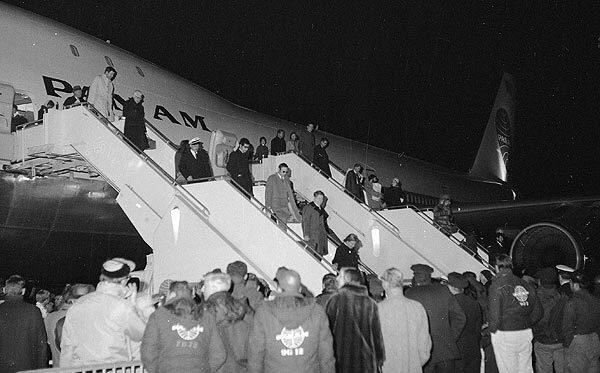 Passengers disembark at Kennedy International Airport after taking the return leg of the Boeing 747's first commercial flight on Jan. 22, 1970. The jumbo jet left New York for London early that morning and returned later that day.