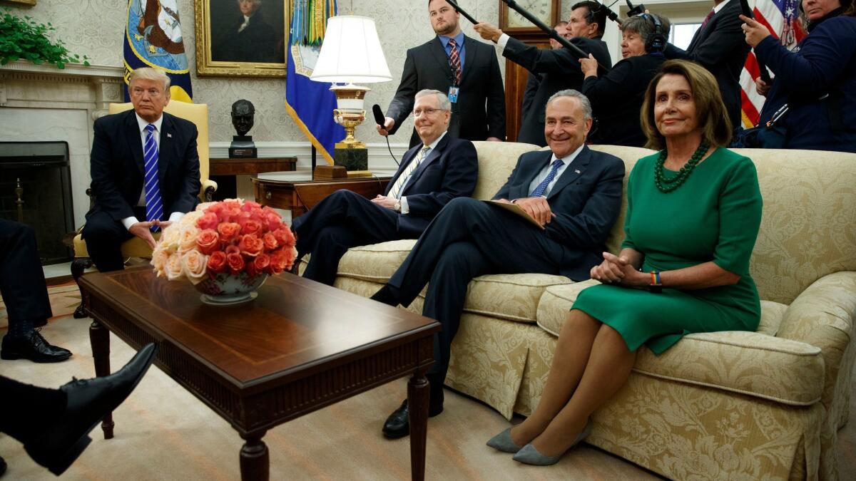President Trump meets with, from right, House Minority Leader Nancy Pelosi, Senate Minority Leader Charles E. Schumer, Senate Majority Leader Mitch McConnell and other congressional leaders in the Oval Office on Sept. 6.