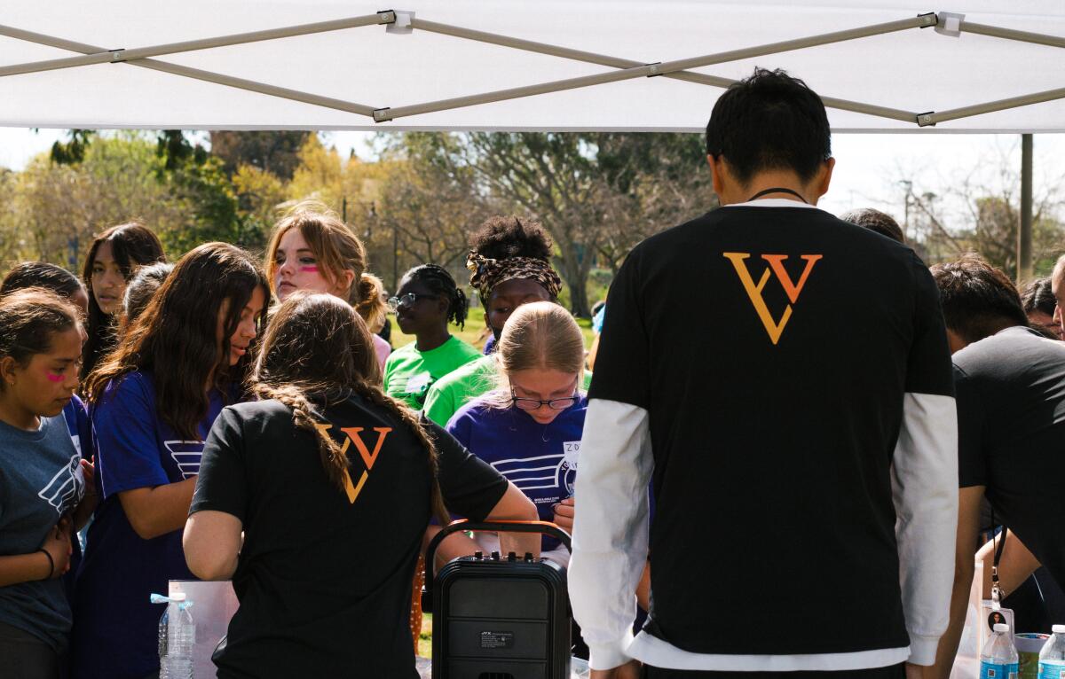 Student beneficiaries gather at a recent Triple V event.