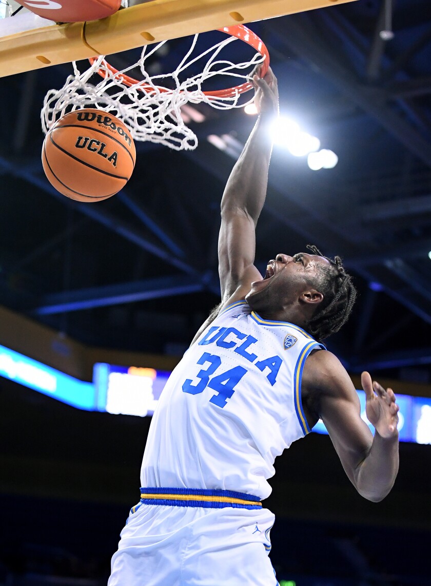 UCLA's David Singleton dunks against North Florida.