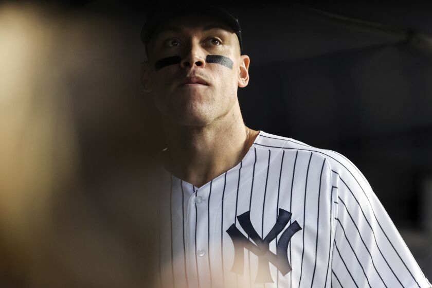 New York Yankees' Aaron Judge looks out before a baseball game against the Boston Red Sox Sunday, Sept. 25, 2022, in New York. (AP Photo/Jessie Alcheh)