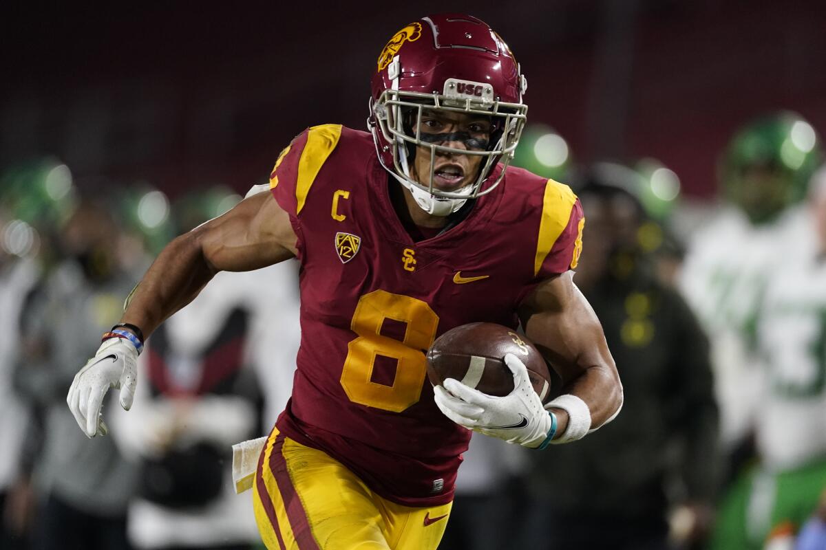 USC wide receiver Amon-Ra St. Brown carries the ball