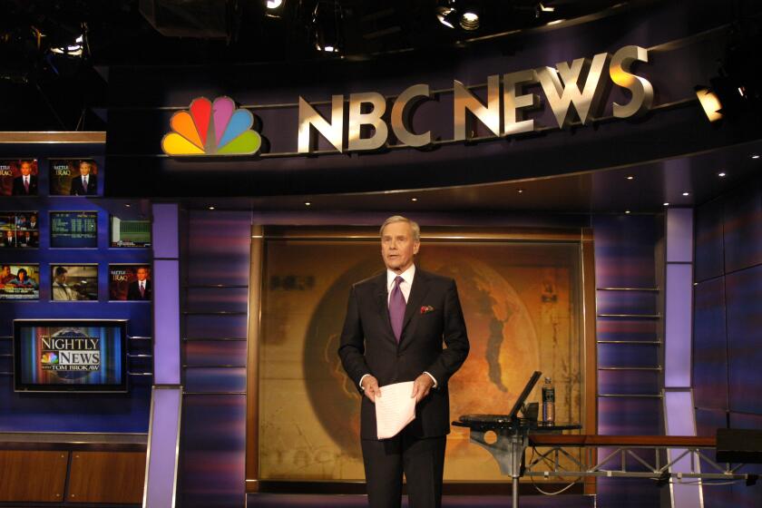 Tom Brokaw signs off for the final time on NBC Nightly News December 1, 2004 in New York.