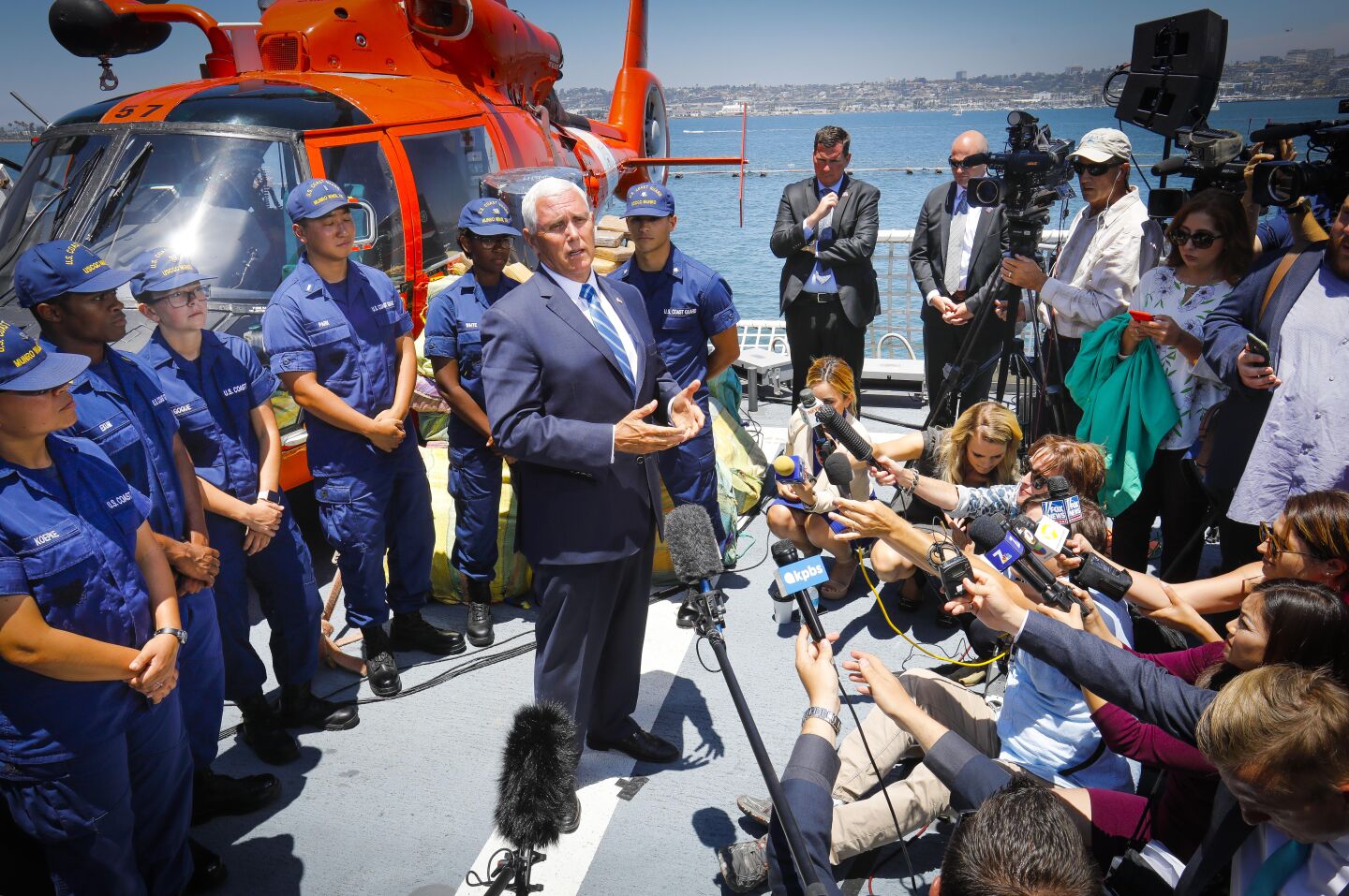 Vice President Mike Pence talks with reporters after delivering his remarks at Naval Air Station North Island aboard the U.S. Coast Guard cutter Munro, July 11, 2019, in Coronado, California during his first official trip to San Diego County since taking office. The Munro, homeported in Alameda, is tasked with seizing drugs in international waters. About 39,000 pounds of cocaine, and 1,000 pounds of marijuana seized in the Eastern Pacific Ocean in the last few months by the Coast Guard was on display during the visit, and offloaded after the Vice President left the base.