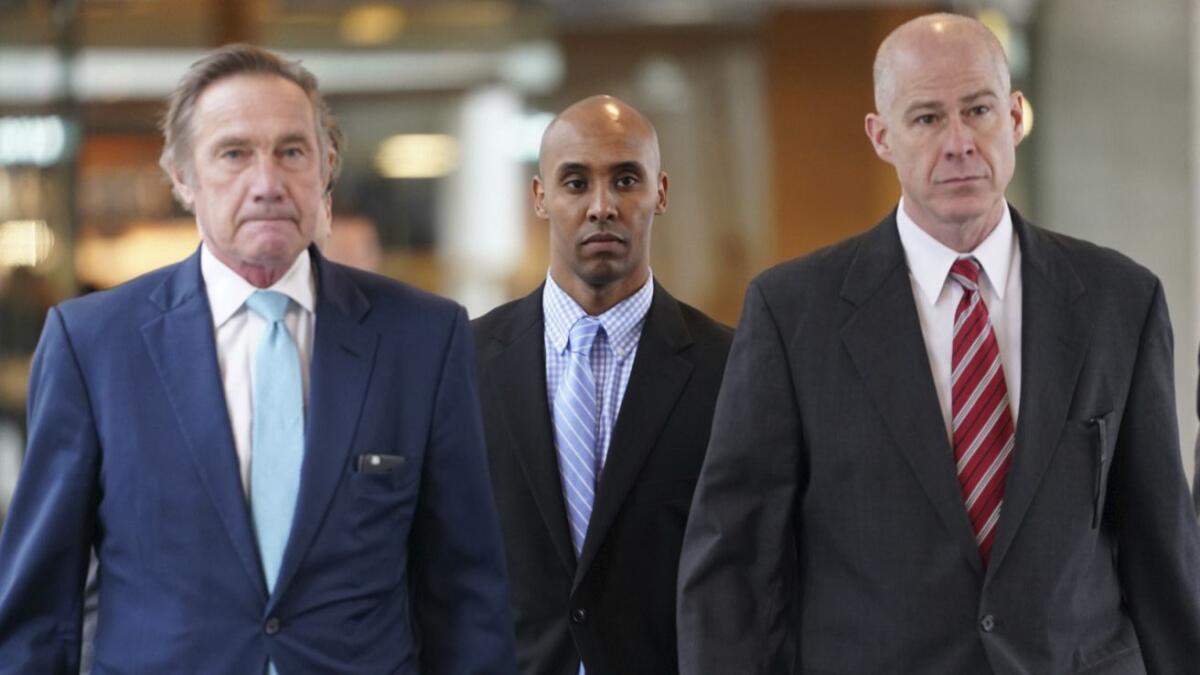 Former Minneapolis Police Officer Mohamed Noor heads into the Hennepin County Government Center in Minneapolis to hear the verdict in his trial Tuesday.