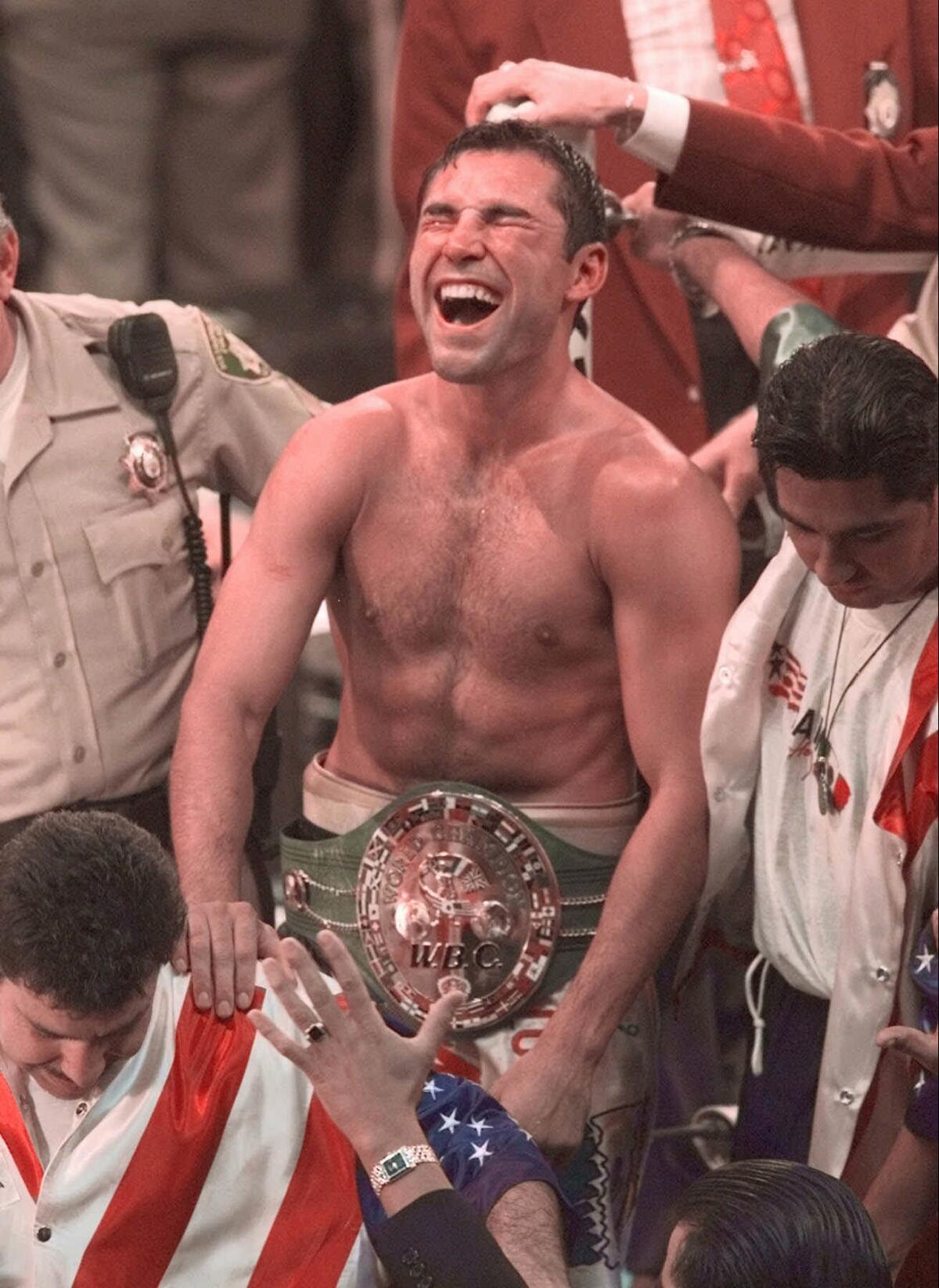 Oscar De La Hoya celebrates his win over Julio Cesar Chavez 