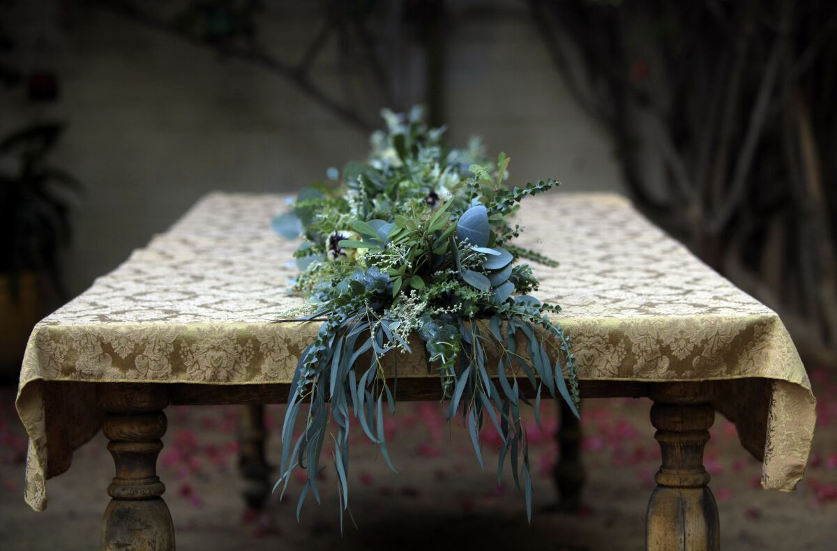 Floral designer Lori Eschler Frystak of Blossom Alliance foraged in her Los Angeles backyard, as well as her neighbors', to create an elegant garland for the holidays.