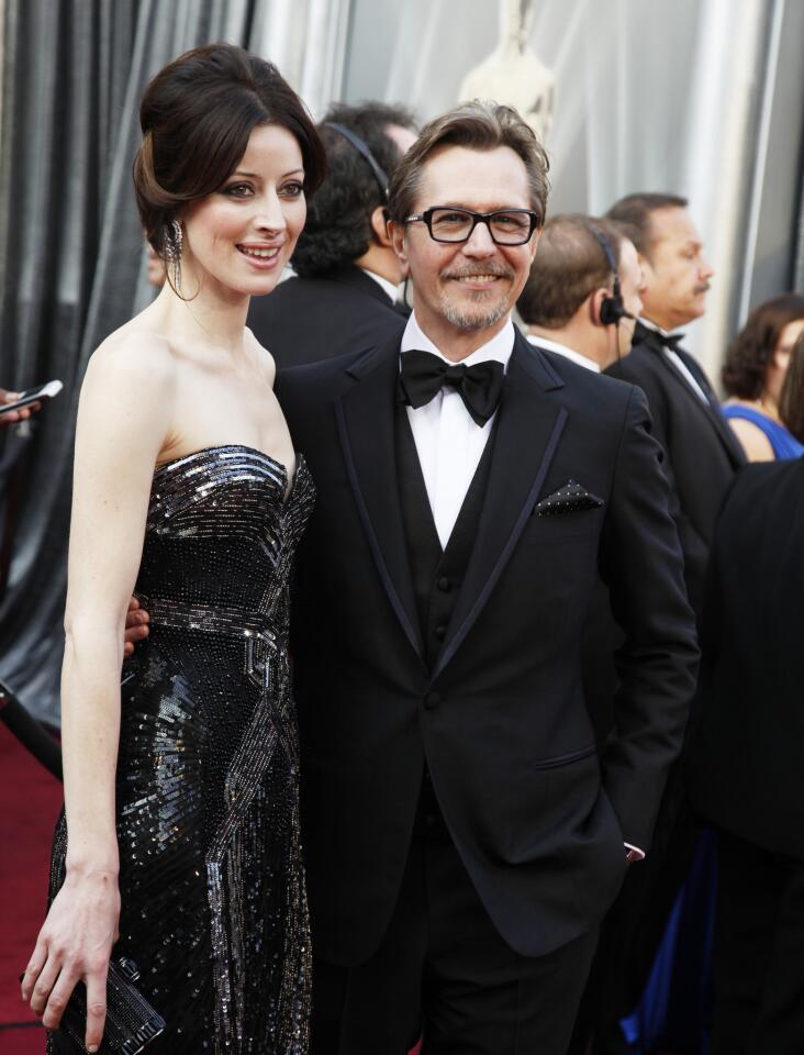 Oscar nominee Gary Oldman ("Tinker Tailor Soldier Spy") and wife Alexandra Edenborough.