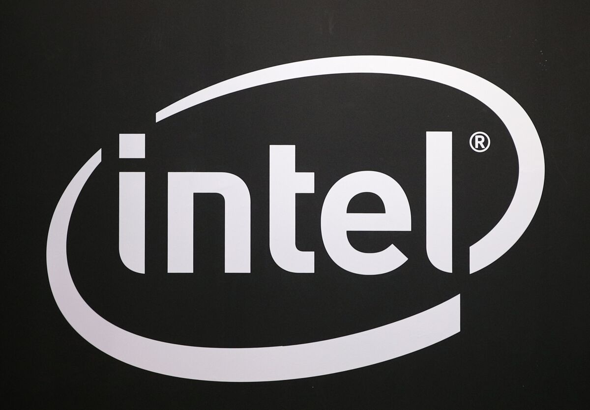 The logo of semiconductor chip maker Intel is pictured at the Paris games week in Paris, Nov. 4, 2017. The U.S. chipmaker unveiled plans on Tuesday, March 15, 2022 to invest up to $88 billion across Europe as part of an ambitious expansion aimed at evening out imbalances in the global semiconductor supply chain. Intel is in talks with Italy for a back-end manufacturing facility. There are also plans to expand in France, Poland and Spain. (AP Photo/Christophe Ena)