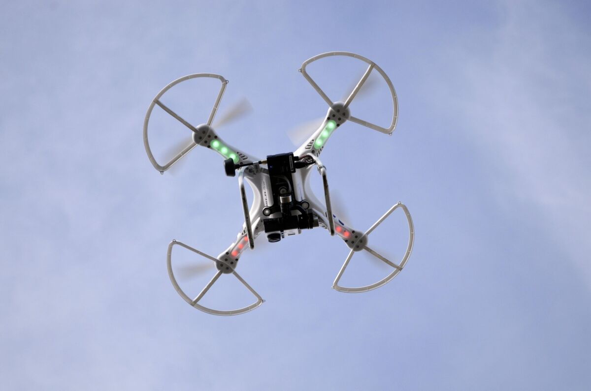 An aerial drone with a high-quality video camera records the landscape of the Berkshire Equestrian Center in Richmond, Mass. The California Assembly approved a bill Wednesday that would impose privacy restrictions on the use of drones by law enforcement and public agencies.