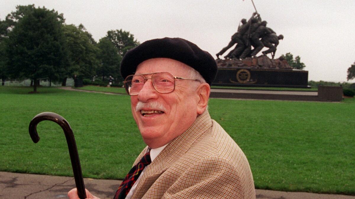 Pulitzer Prize-winning photographer Joe Rosenthal in 1995, with the Iwo Jima Memorial in Arlington, Va., in the background.
