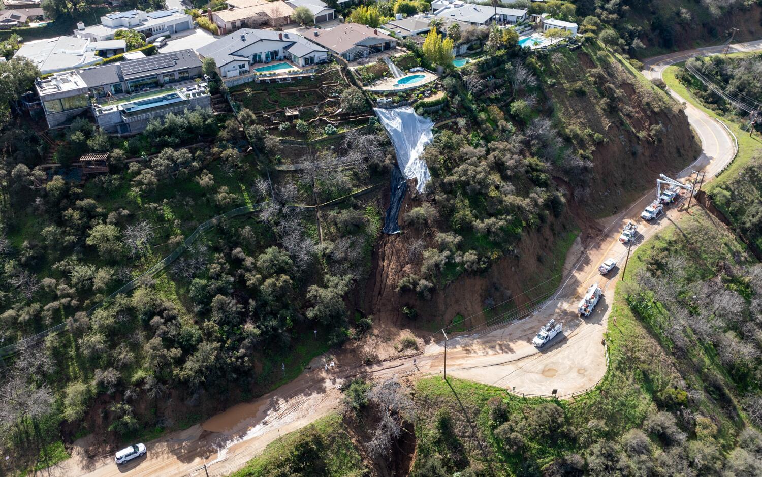 A portion of Mulholland Drive, damaged by mudslides in winter storms, reopens