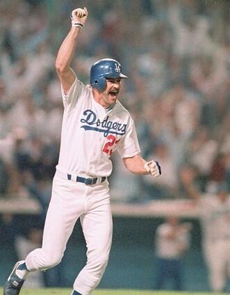 Kirk Gibson, left field 1988 stats: .290, 25 HRs, 76 RBIs (named NL MVP) Where is he now? Gibson is the manager of the Arizona Diamondbacks. What is your most memorable moment from that season. "When we won the World Series, celebrating in that small Oakland locker room and on the plane back to L.A. Because when you do that, along the way, I dont know who picked us that year. Probably nobody. So we always felt like we were against the odds. Then you get closer and closer and closer and youre scared things are going to turn on you the wrong way and they never did. Just getting that last out right there, knowing that it was real." What went through your mind when you hit that Game 1 homer? "First of all, it was like almost some kind of a foolish thing to really go up there and hit just because of the shape I was in. Just really sitting there in the clubhouse and almost dreaming about doing it, then to go up there and do it, it was like 'Can you believe it?' I remember when I was rounding the bases, my parents went through my mind. Throughout my career, there were a lot of doubters, a lot of people who directed a lot of criticism at me. People would say things to my dad, and initially, early in my career, they had to defend me. I told them, 'You guys dont have to defend me. I'm going to bust it and I'm going to fail sometimes. But we'll have a laugh some day that it will all be worth it.' When I did it, I thought, 'This is the moment.' Literally as I was rounding the bases, past second base. When I got to home plate I remember thinking, You guys don't jump on me, because I was hurting. I was like, 'no, no,' but it didnt matter. Then right at the end of the game when I went in, I think it was Bob Costas, he wanted me to go right on TV. I said, No, because I wanted to go in and celebrate with my teammates. I walked in and everybody waited. Then jumped around. Then I went back out and did the interview with Bob Costas, I believe. It was on the scoreboard. I went out there five to 10 minutes later and nobody had left. Do you ever wear your World Series ring? "I've worn it probably less than five times. I keep it in a safe place; it's secure. It's in a safe. I don't wear jewelry. I cant even think of the last time I had it on. It's a keepsake. They're all too big. When someone shakes your hand it almost breaks your finger."