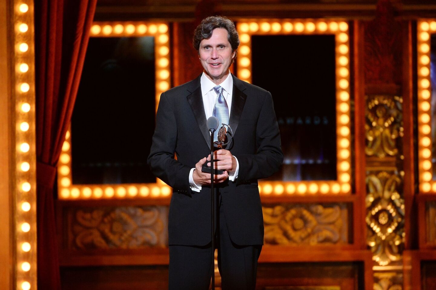 Brian Ronan accepts the award for best sound design of a musical for the Carole King musical "Beautiful."