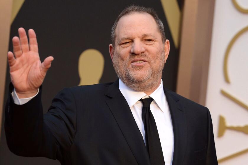 FILE - In this March 2, 2014 file photo, Harvey Weinstein arrives at the Oscars in Los Angeles. In the wake of sexual harassment and abuse allegations against Weinstein, many in Hollywood are calling for sweeping changes to the entertainment industry to prevent the mistreatment of women. Among some of the changes experts recommend are an independent agency to investigate harassment complaints and preventing sexual harassment allegations from being hidden behind non-disclosure agreements. (Photo by Jordan Strauss/Invision/AP, File)