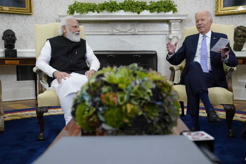 President Joe Biden meets with Indian Prime Minister Narendra Modi in the Oval Office of the White House, Friday, Sept. 24, 2021, in Washington. (AP Photo/Evan Vucci)