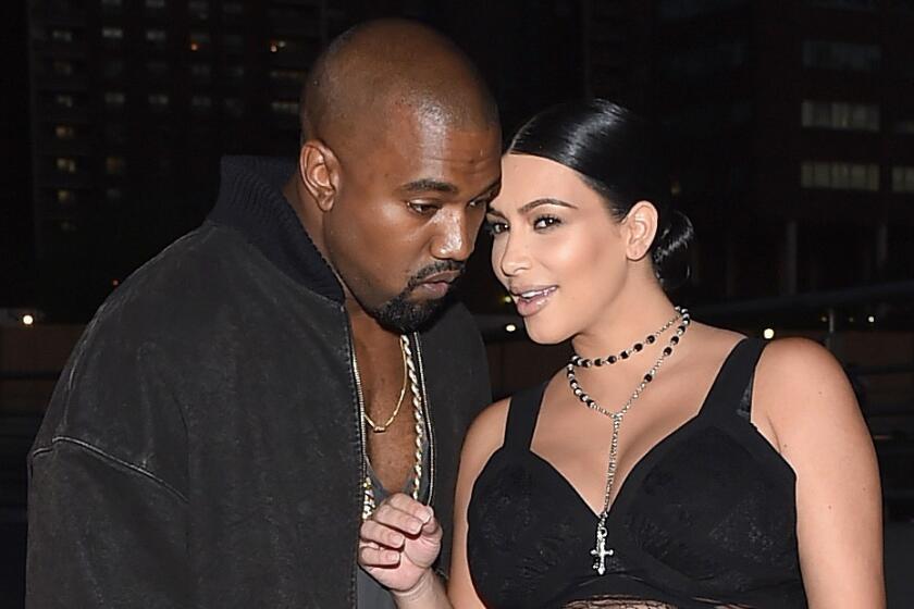 Kim Kardashian was accused of channeling husband Kanye West in responding to critics slamming her latest nude selfie.