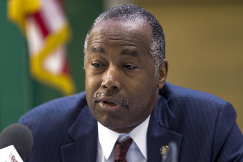 LOS ANGELES, CA - SEPTEMBER 18, 2019 — Department of Housing and Urban Development (HUD) Secretary Ben Carson talks to media after touring “Sprung Structure” for homeless installed at Union Rescue Mission, a non-profit facility that provides a range of services to individuals and families facing homelessness. (Irfan Khan/Los Angeles Times)