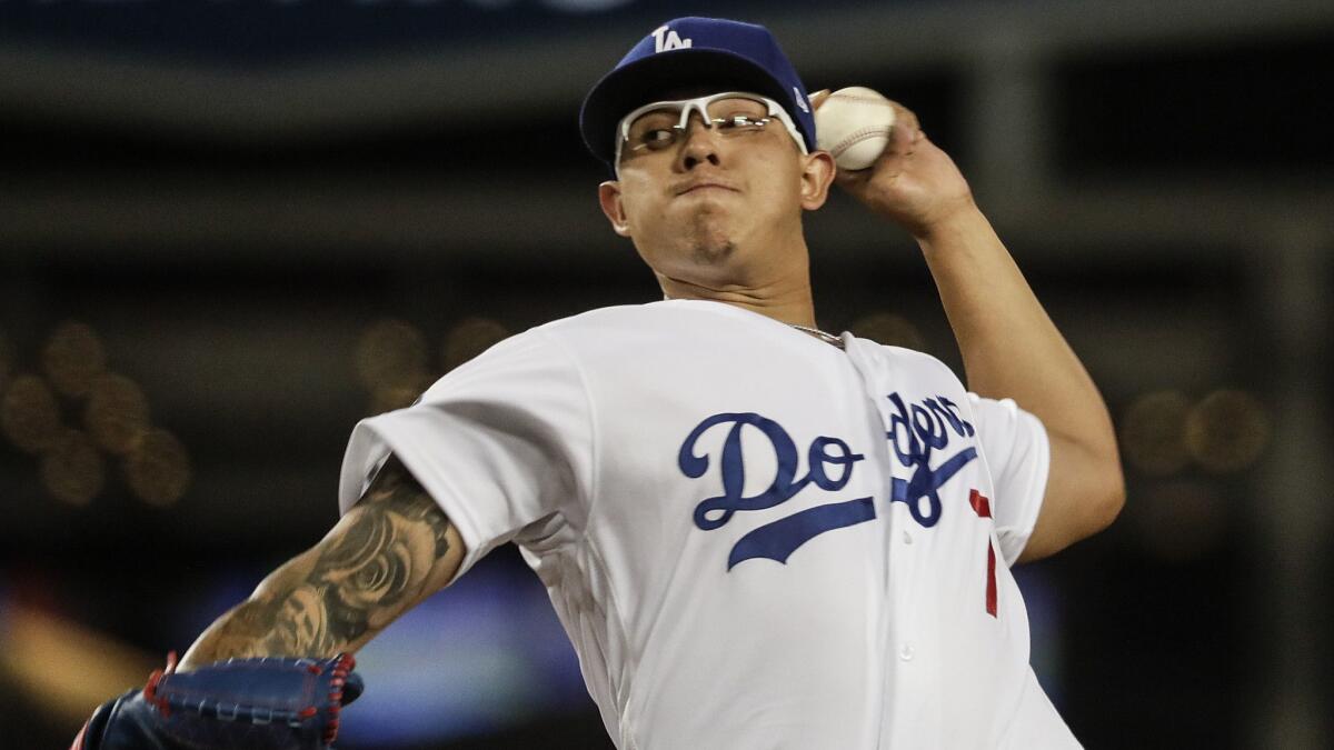 Dodgers starter Julio Urías pitches against the Giants in the fourth inning at Dodger Stadium. (Robert Gauthier/Los Angeles Times)
