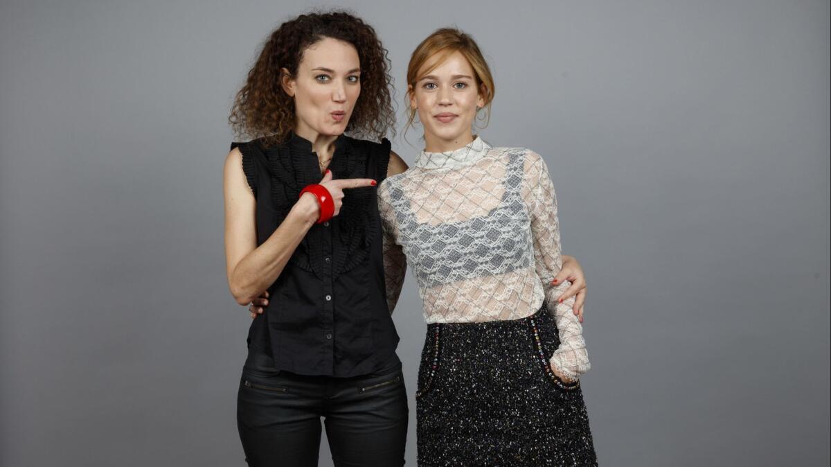 "Revenge" director Coralie Fargeat, left, and star Matilda Lutz at the L.A. Times headquarters at the 2017 Toronto International Film Festival.