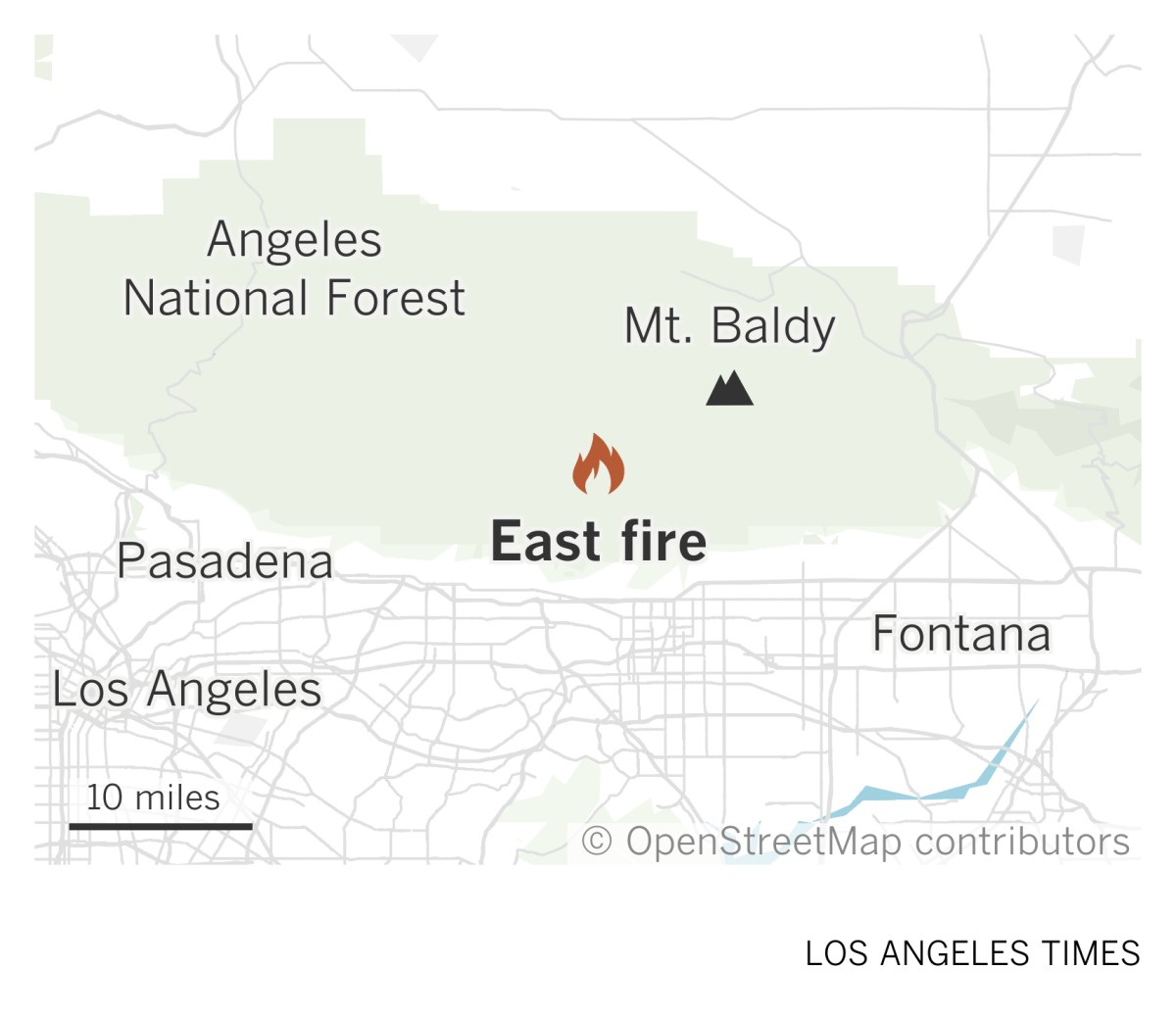 A map of the Angeles National Forest area shows the location of the East fire burning southwest of Mt. Baldy