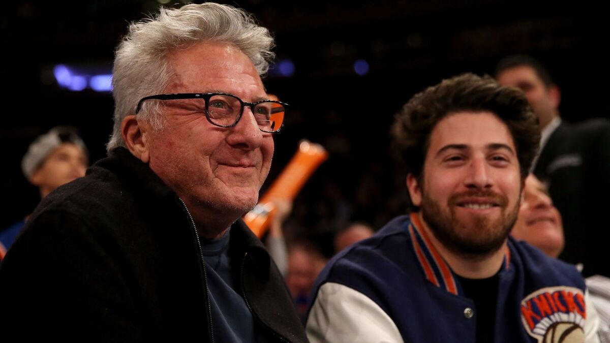 Dustin Hoffman, left, and son Jacob Hoffman attend the NBA game between the New York Knicks and the San Antonio Spurs at Madison Square Garden on Feb. 12.