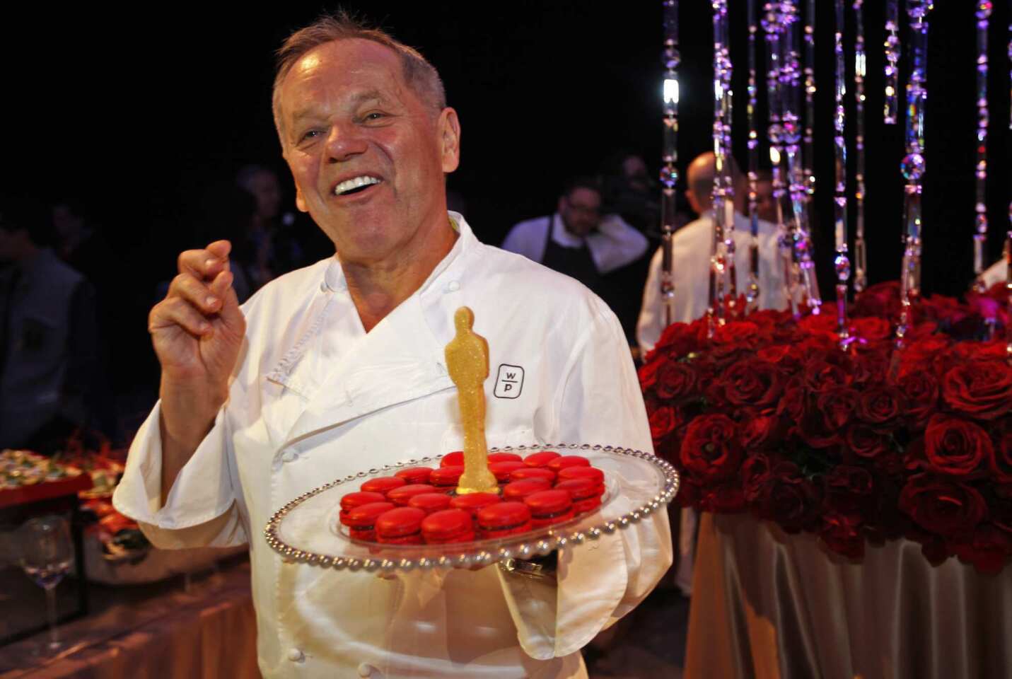 Master Chef Wolfgang Puck poses during the preview of decor and food that will be served at this year's Oscars Governors Ball, the celebration immediately following the 84th Academy Awards.