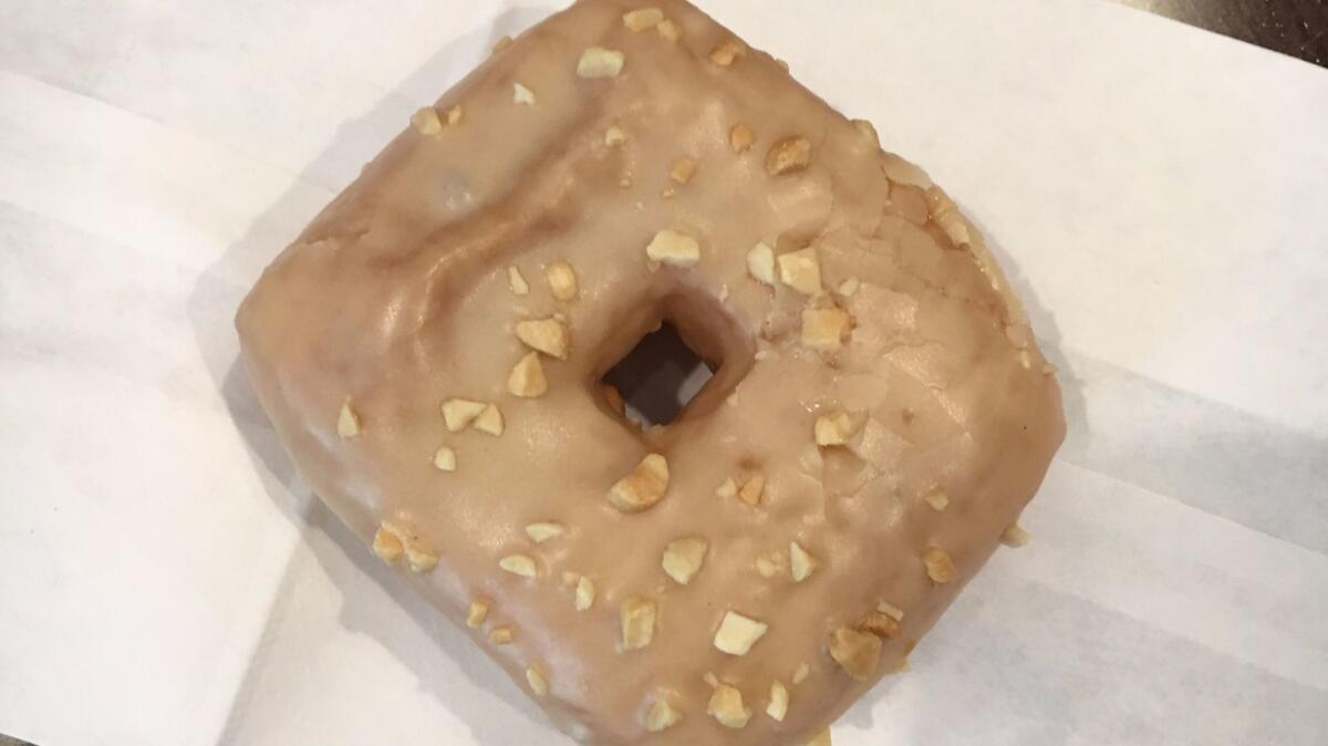 The PB&J doughnut from Astro Doughnuts & Fried Chicken. (Jenn Harris / Los Angeles Times)